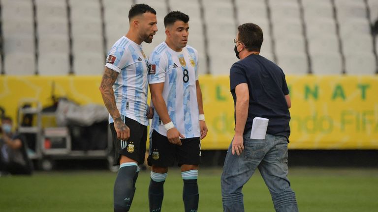 Argentina players are confronted during their match with Brazil