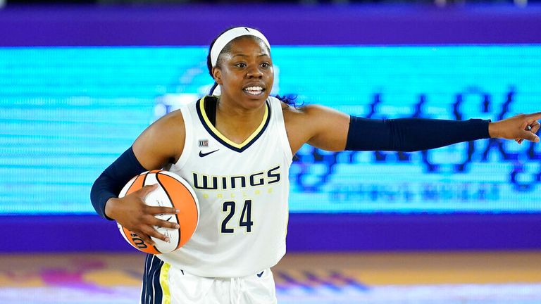 Dallas Wings guard Arike Ogunbowale (24) talks to her teammates