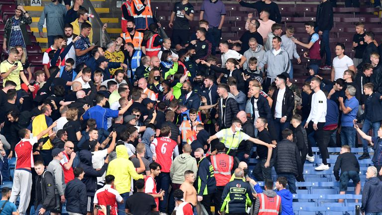 Unsavoury scenes marred the end of the game as Arsenal and Burnley fans threw missiles at each other and had to be separated by stewards at Turf Moor.
