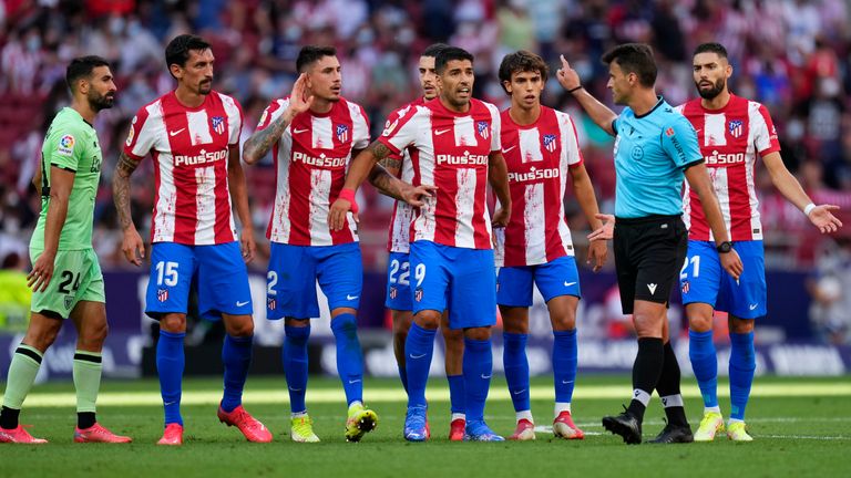 Atletico Madrid's Joao Felix reacts after receiving a red card
