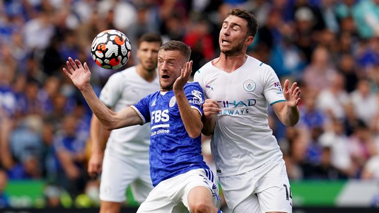 Jamie Vardy is clattered by Aymeric Laporte