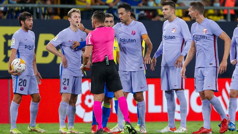 AP - Barcelona crowd round the referee vs Cadiz