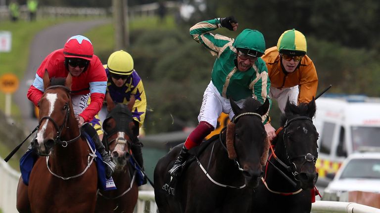 Dettori punches the air as he wins on board Trueba at Bellewstown