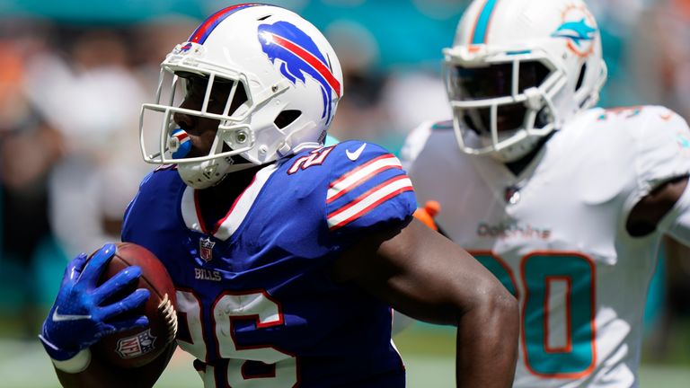 Buffalo Bills running back Devin Singletary runs to score a touchdown against the Miami Dolphins
