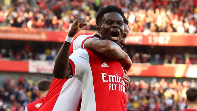 Bukayo Saka celebrates after making it 3-0