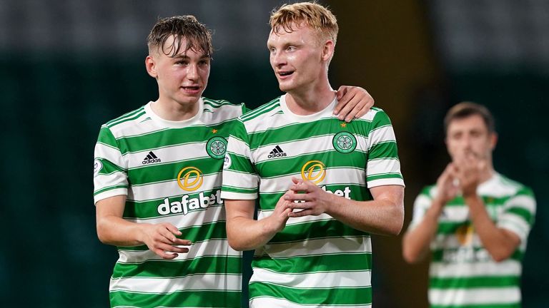 Celtic&#39;s Adam Montgomery (left) and Liam Scales celebrate Celtic&#39;s Scottish League Cup quarter-final win over Raith at Parkhead