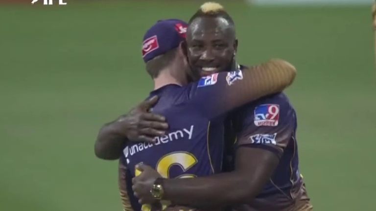 Kolkata Knight Riders' Andre Russell hugs captain Eoin Morgan after yorking AB de Villiers for a duck in the IPL game against Royal Challengers Bangalore