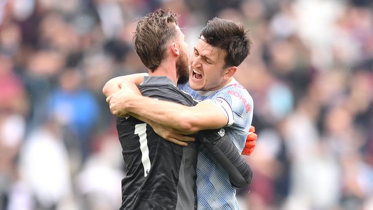 David de Gea celebrates with Harry Maguire after saving a late penalty from Mark Noble