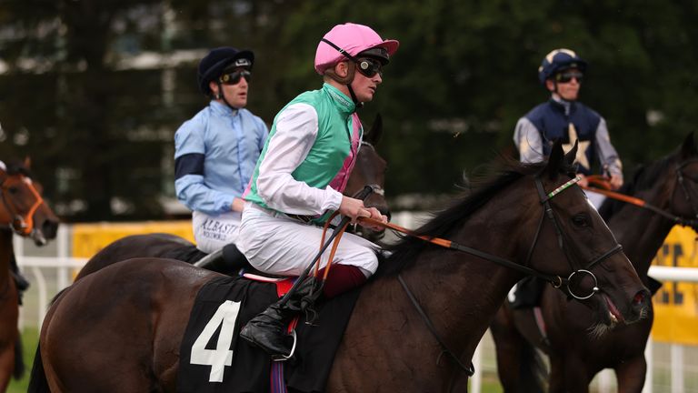 Rob Hornby and Deodar after crossing the line at Newbury on Friday