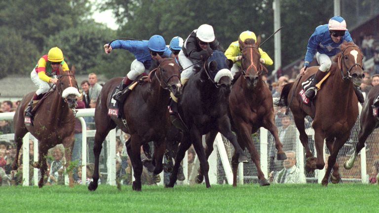 Dettori and Diffident (blue cap) just hold off the late run of Lucayan Prince (white cap)
