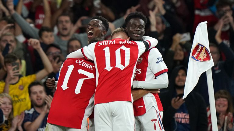 Arsenal's Eddie Nketiah (left, facing) celebrates with team-mates after scoring their side's third goal of the game during the Carabao Cup third round match at the Emirates Stadium