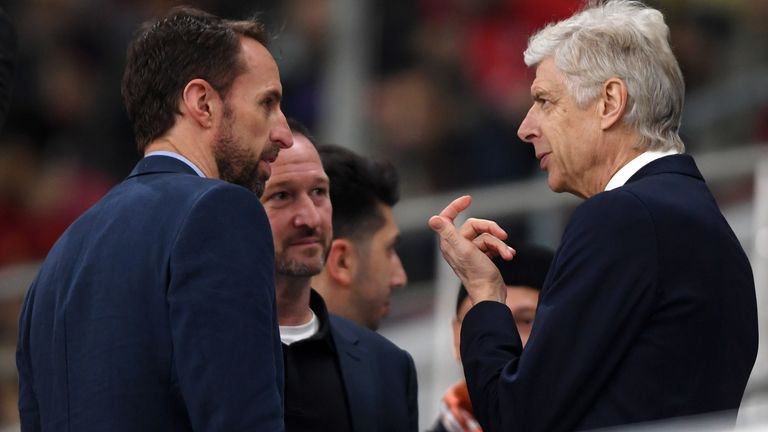DOHA, QATAR - DECEMBER 18: Gareth Southgate, Manager of England (L) speaks to Arsene Wenger, Head of Global Football Development at FIFA (R) during the FIFA Club World Cup semi-final match between Monterrey and Liverpool FC at Khalifa International Stadium on December 18, 2019 in Doha, Qatar. (Photo by Mike Hewitt - FIFA/FIFA via Getty Images)