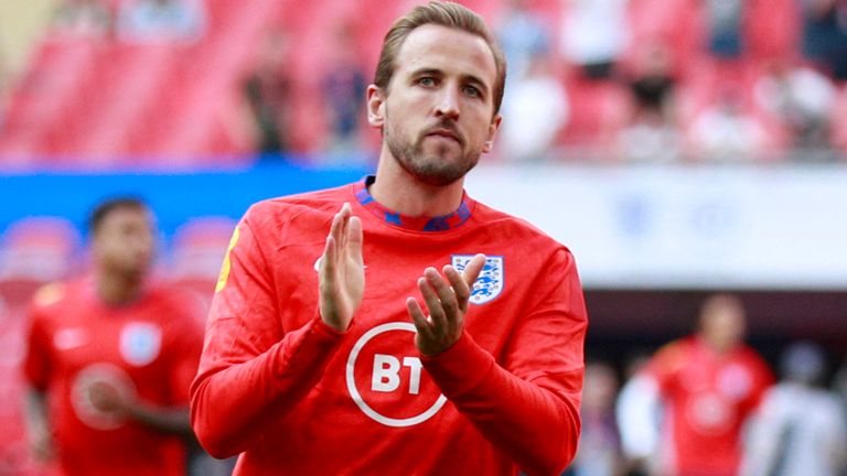 England's Harry Kane applauds the fans during warmup before the World Cup 2022 group I qualifying soccer match between England and Andorra at Wembley stadium in London, Sunday, Sept. 5, 2021. (AP Photo/Ian Walton)