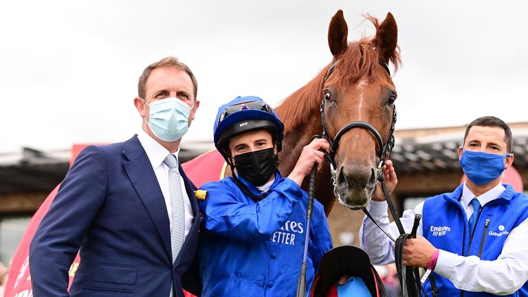 Hurricane Lane with trainer Charlie Appleby and jockey William Buick after Irish Derby success