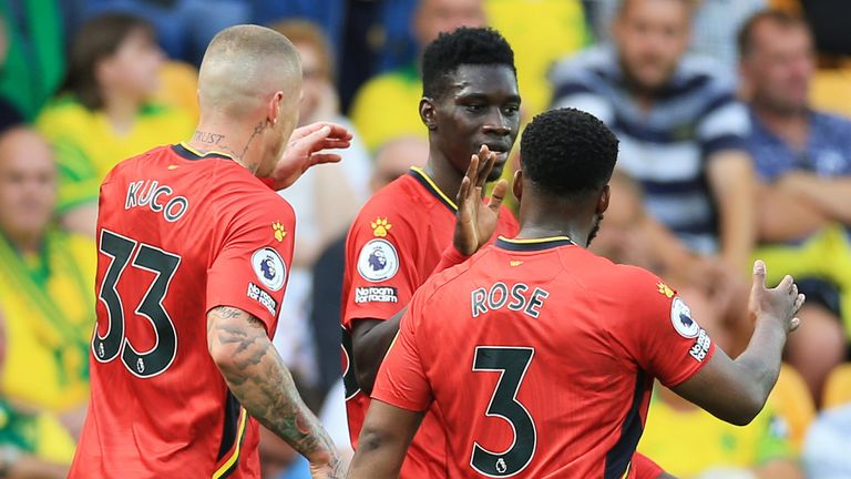 Ismaila Sarr celebrates the first of his two goals at Carrow Road