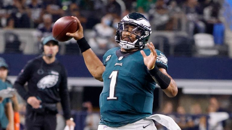 Philadelphia Eagles quarterback Jalen Hurts throws a pass late in the second half of an NFL football game against the Dallas Cowboys