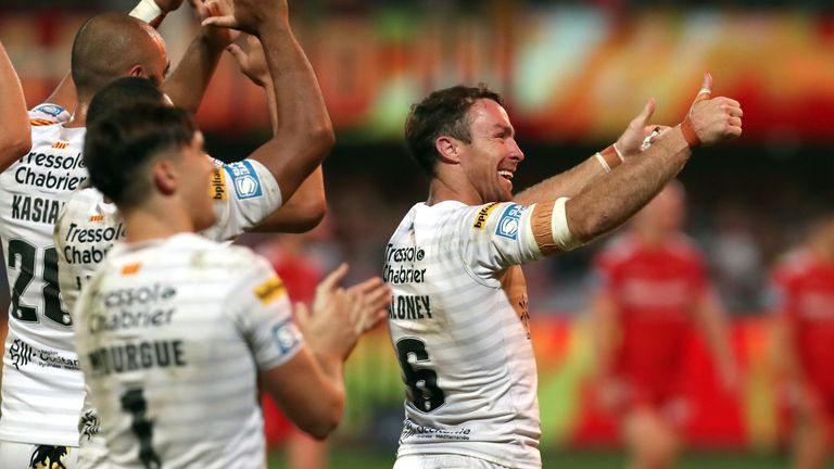 Picture by Manuel Blondeau/SWpix.com - 30/09/2021 - Rugby League - Betfred Super League Semi Final - Catalans Dragons v Hull KR - Stade Gilbert Brutus, Perpignan, France - James Maloney of Dragons Catalans celebrates victory