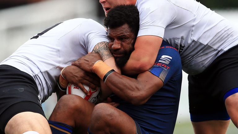 TORONTO, ON - SEPTEMBER 02: Jack Bussey #13 of Toronto Wolfpack tackles Jessie Joe Parker #4 of Whitehaven RLFC in the first half of a Kingstone Press League 1 Super 8s match at Lamport Stadium on September 2, 2017 in Toronto, Canada. (Photo by Vaughn Ridley/SWpix.com)