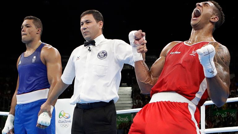 France&#39;s Tony Victor James Yoka, right, reacts as he won the gold medal for the men&#39;s super heavyweight over 91-kg boxing against Britain&#39;s Joe Joyce at the 2016 Summer Olympics in Rio de Janeiro, Brazil, Sunday, Aug. 21, 2016. (AP Photo/Frank Franklin II)