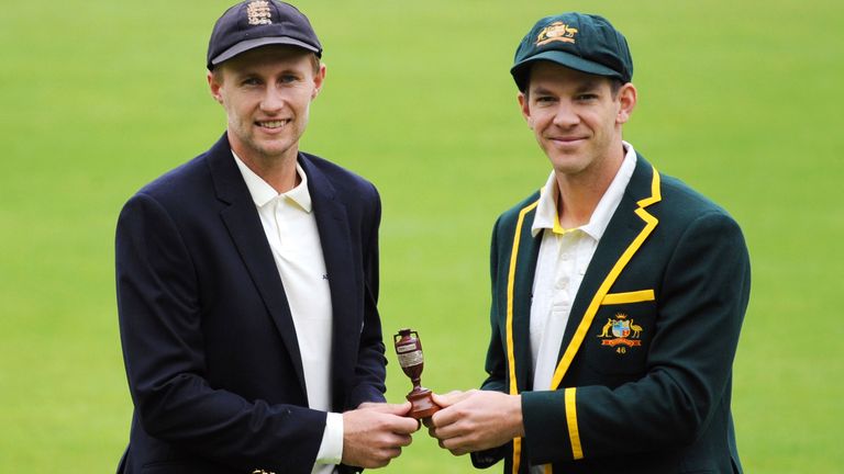 England captain Joe Root and Australia captain Tim Paine pose with the Ashes urn (AP)