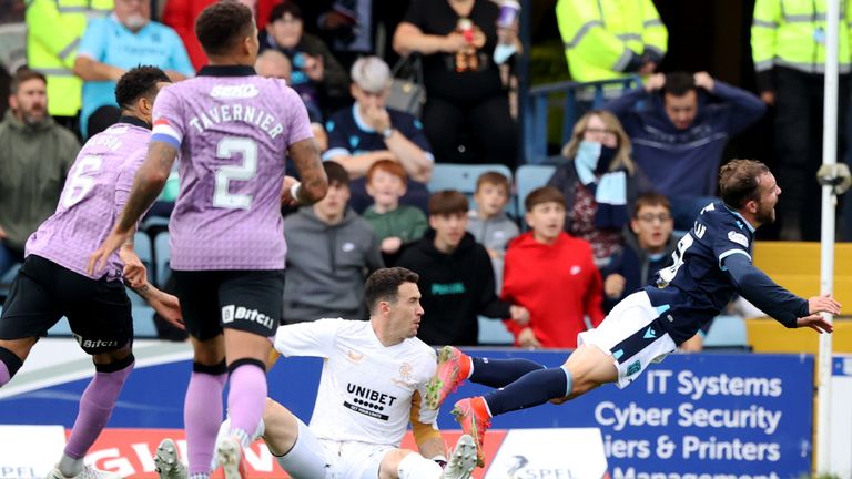 DUNDEE, SCOTLAND - SEPTEMBER 25: Jon McLaughlin fouls Paul McMullan and a penalty is awarded during a cinch Premiership match between Dundee and Rangers at the Kilmac Stadium at Dens Park, on September 25, 2021, in Dundee, Scotland. (Photo by Craig Williamson / SNS Group)