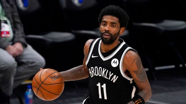 Brooklyn Nets guard Kyrie Irving handles the ball during an NBA basketball game against the Dallas Mavericks in Dallas, in this Thursday, May 6, 2021, file photo. Unable to attend the Brooklyn Nets&#39; media day, Kyrie Irving asked for privacy Monday when pressed about his vaccination status and availability for home games. (AP Photo/Tony Gutierrez)
