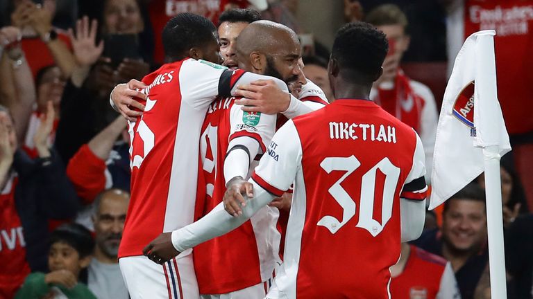 Alexandre Lacazette celebrates after scoring from the penalty spot