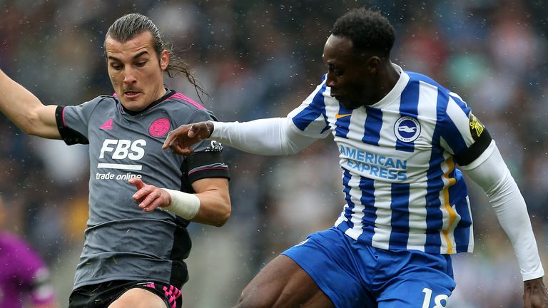 Leicester City's Caglar Soyuncu and Brighton and Hove Albion's Danny Welbeck battle for the ball