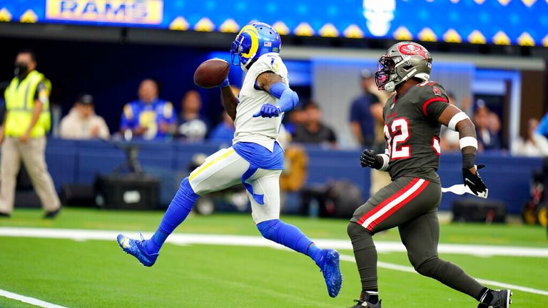Los Angeles Rams wide receiver DeSean Jackson left, scores a touchdown past Tampa Bay Buccaneers safety Mike Edwards during the second half of an NFL football game against the Tampa Bay Buccaneers Sunday, Sept. 26, 2021, in Inglewood, Calif. (AP Photo/Jae C. Hong)