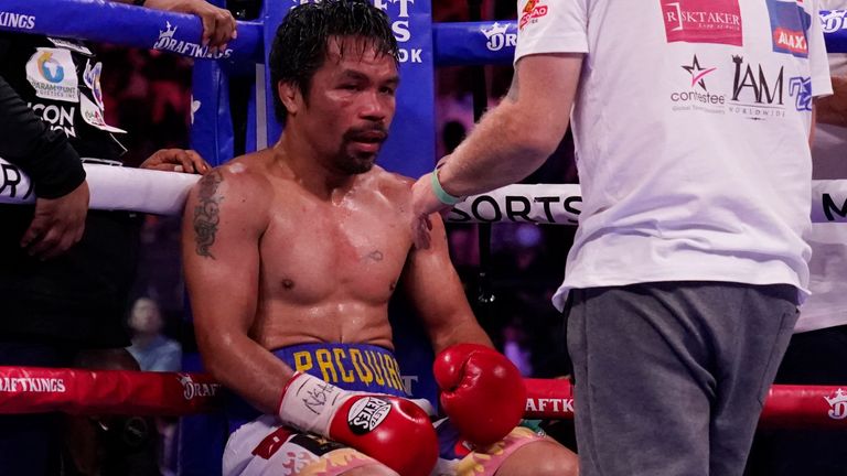 Manny Pacquiao between rounds against Yordenis Ugas (AP)