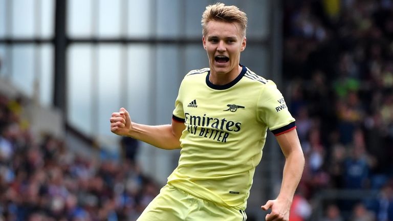Martin Odegaard celebrates after giving Arsenal the lead with a stunning free-kick