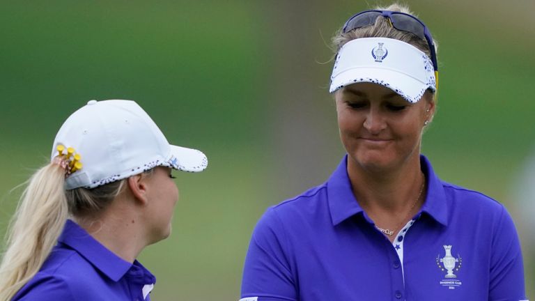 Europe's Matilda Castren, left, Anna Nordqvist celebrate on the third hole during the foursome matches at the Solheim Cup golf tournament, Saturday, Sept. 4, 2021, in Toledo, Ohio. (AP Photo/Carlos Osorio).