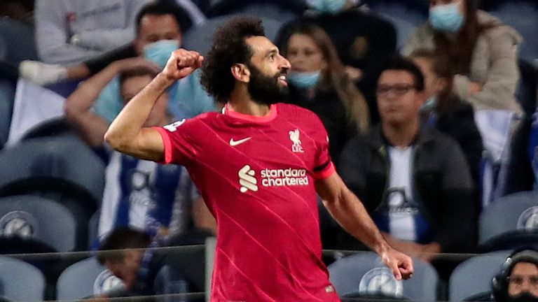 Liverpool&#39;s Mohamed Salah celebrates after scoring his side&#39;s third goal during the Champions League group B soccer match between FC Porto and Liverpool at the Dragao stadium 