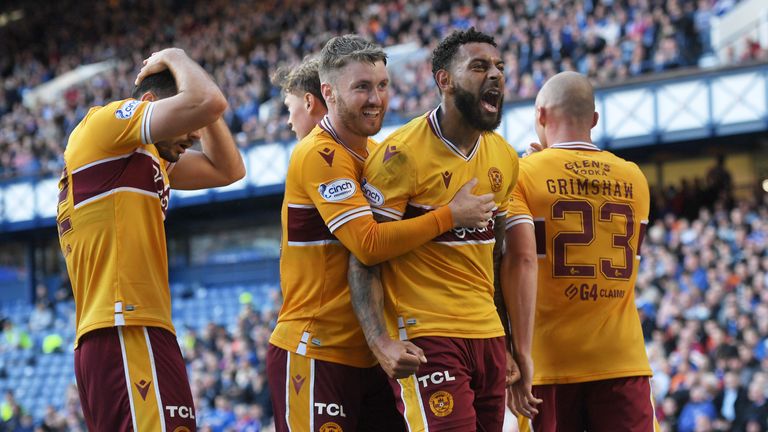 GLASGOW, SCOTLAND - SEPTEMBER 19: Motherwell's Kaiyne Woolery celebrates with Callum Slattery after he makes it 1-1  during a cinch Premiership match between Rangers and Motherwell at Ibrox Stadium on September 19, 2021, in Glasgow, Scotland. (Photo by Craig Foy / SNS Group)...
