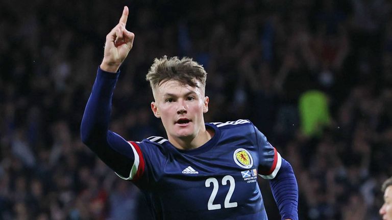 Scotland&#39;s Nathan Patterson celebrates after his shot is tapped in by Lyndon Dykes against Moldova