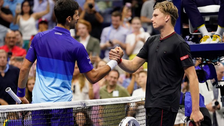 Novak Djokovic and Jenson Brooksby after their fourth round match at the 2021 US Open