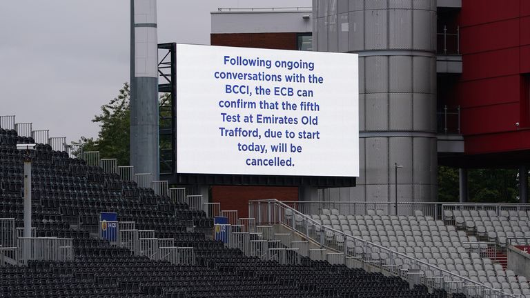 PA - Board at Old Trafford displaying news of the fifth Test cancellation 