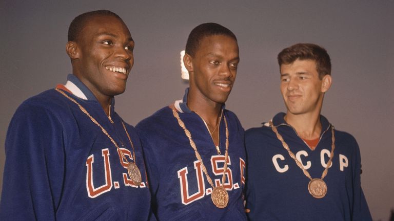 The three winners of the long jump event of the Rome Summer Olympics, Sept. 2, 1960 stand on the winner's podium at the Olympic Stadium after they received their medals. From left are: Ralph Boston; Irvin Roberson; and Soviet's Igor Ter-Ovanesian.