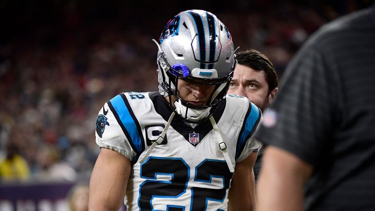 Carolina Panthers running back Christian McCaffrey leaves the field during the first half of an NFL football game against the Houston Texans