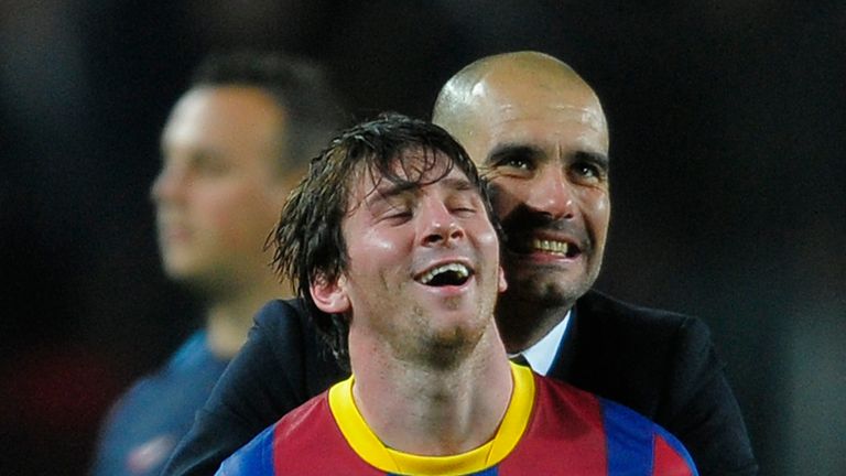 AP - Pep Guardiola with Messi