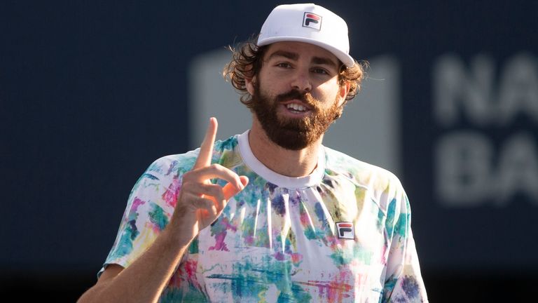 American Reilly Opelka reacts after defeating Stefanos Tsitsipas, of Greece, during the semifinals of the National Bank Open men’s tennis tournament Saturday, Aug. 14, 2021, in Toronto. (Chris Young/The Canadian Press via AP)