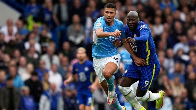 Rodri and Romelu Lukaku battle for possession at Stamford Bridge (AP)