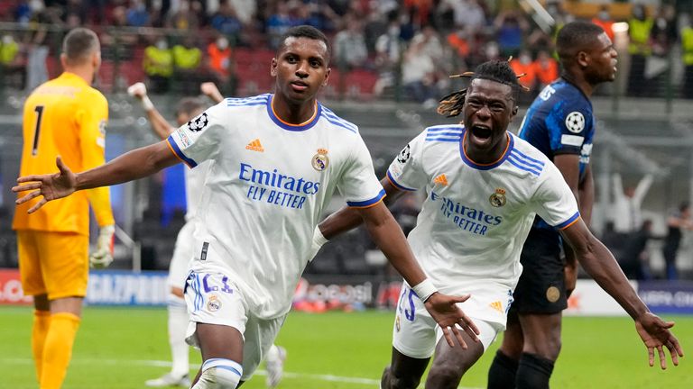 Real Madrid's Rodrygo celebrates with Eduardo Camavinga after scoring the winner against Inter