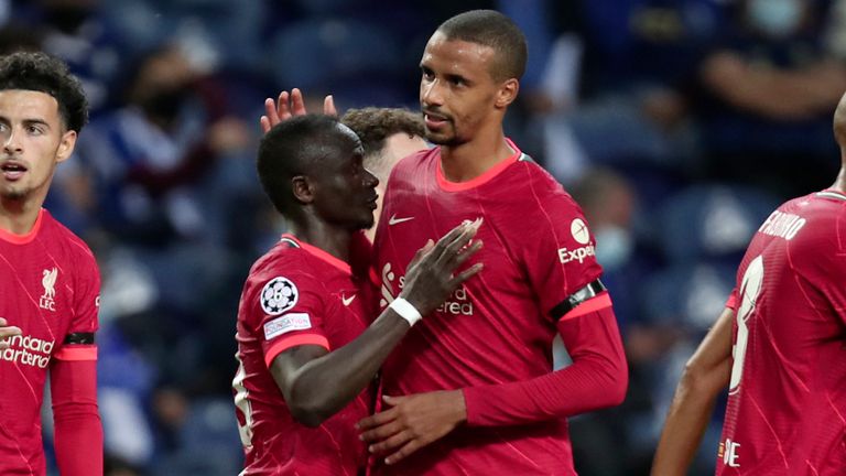 Liverpool&#39;s Sadio Mane, 3rd left, celebrates with Joel Matip after scoring his side&#39;s second goal during the Champions League group B soccer match between FC Porto and Liverpool at the Dragao stadium