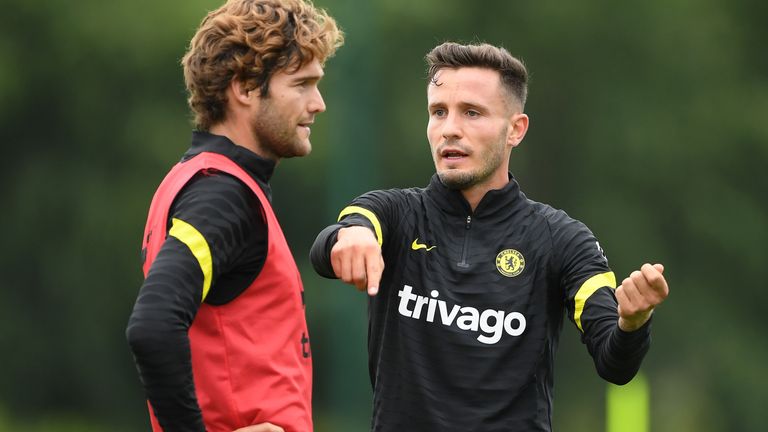 Saul Niguez speaks to Marcos Alonso in Chelsea training
