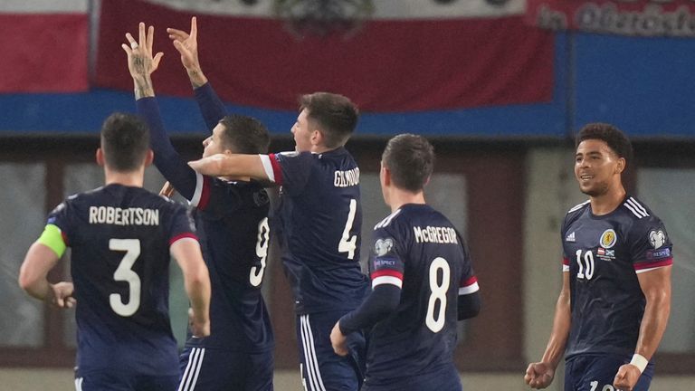 Scotland celebrate Lyndon Dykes' penalty