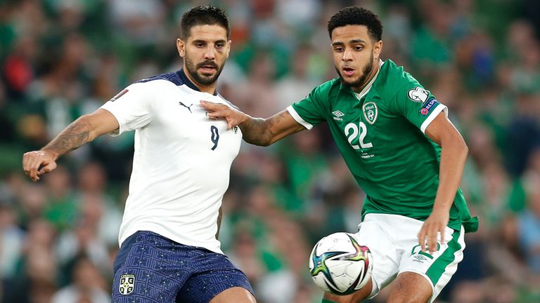 Serbia's Aleksandar Mitrovic battles for possession with Republic of Ireland's with Andrew Omobamidele