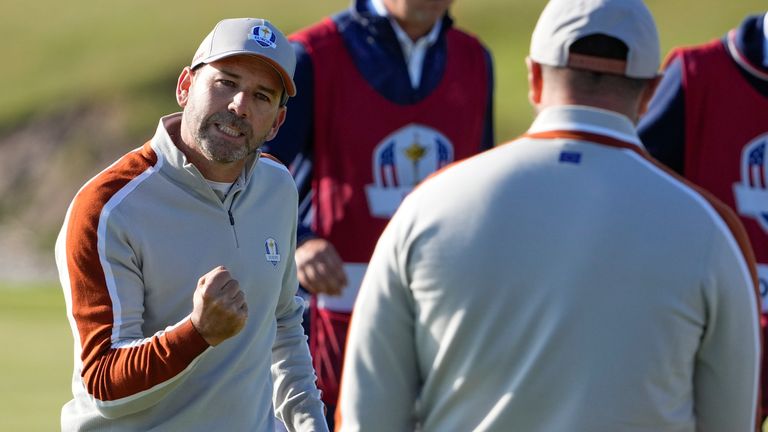 Team Europe's Sergio Garcia reacts to a putt on the eighth hole during Saturday's foursomes match (AP)