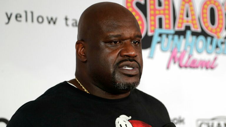 In this Jan. 31, 2020, file photo, former NBA player Shaquille O&#39; Neal is interviewed on the red carpet for Shaq&#39;s Fun House in Miami. O&#39;Neal is set to perform in his first competitive match when he teams in All Elite Wrestling with Jade Cargill in a mixed tag to take on Cody Rhodes and Red Velvet at Daily&#39;s Place on an episode of "Dynamite," Wednesday, March 3, 2021. (AP Photo/Lynne Sladky, File)