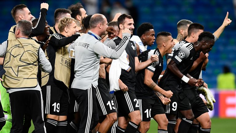 Sheriff players and staff celebrate their victory at the Bernabeu